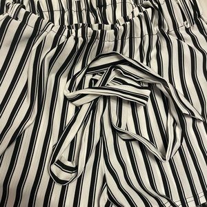 Black and white stripped shorts, size large